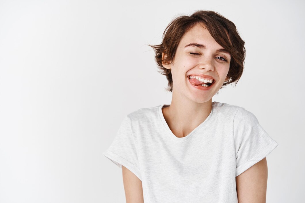 https://ru.freepik.com/free-photo/carefree-girl-with-short-hair-winking-and-showing-tongue-with-silly-happy-face-standing-happy-in-t-shirt-against-white-wall_16225925.htm#fromView=search&page=1&position=6&uuid=9d19fa0a-df00-4ca1-98a5-75dd86530c02